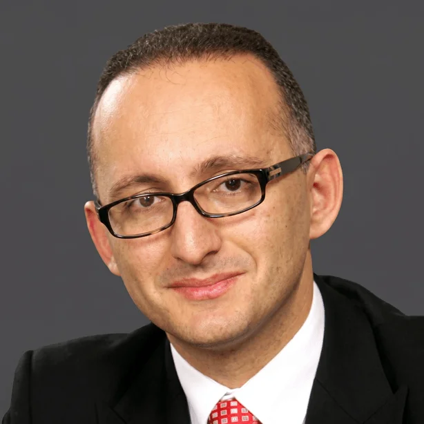 Dr. Charlon Gouder